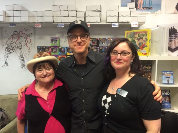 Alan with Parents Helping Parents representative Melanie and Illusive Comics & Games owner Anna.